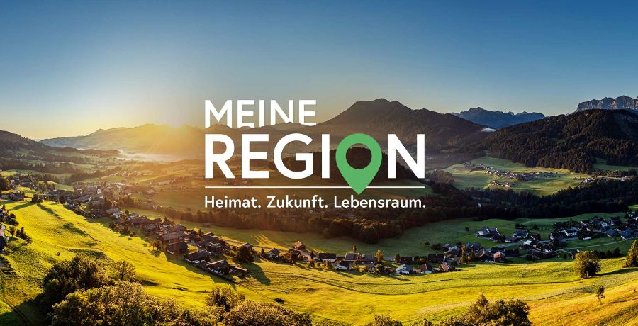 Landschaft mit dem Logo "Meine Region - Heimat, Zukunft, Lebensraum"